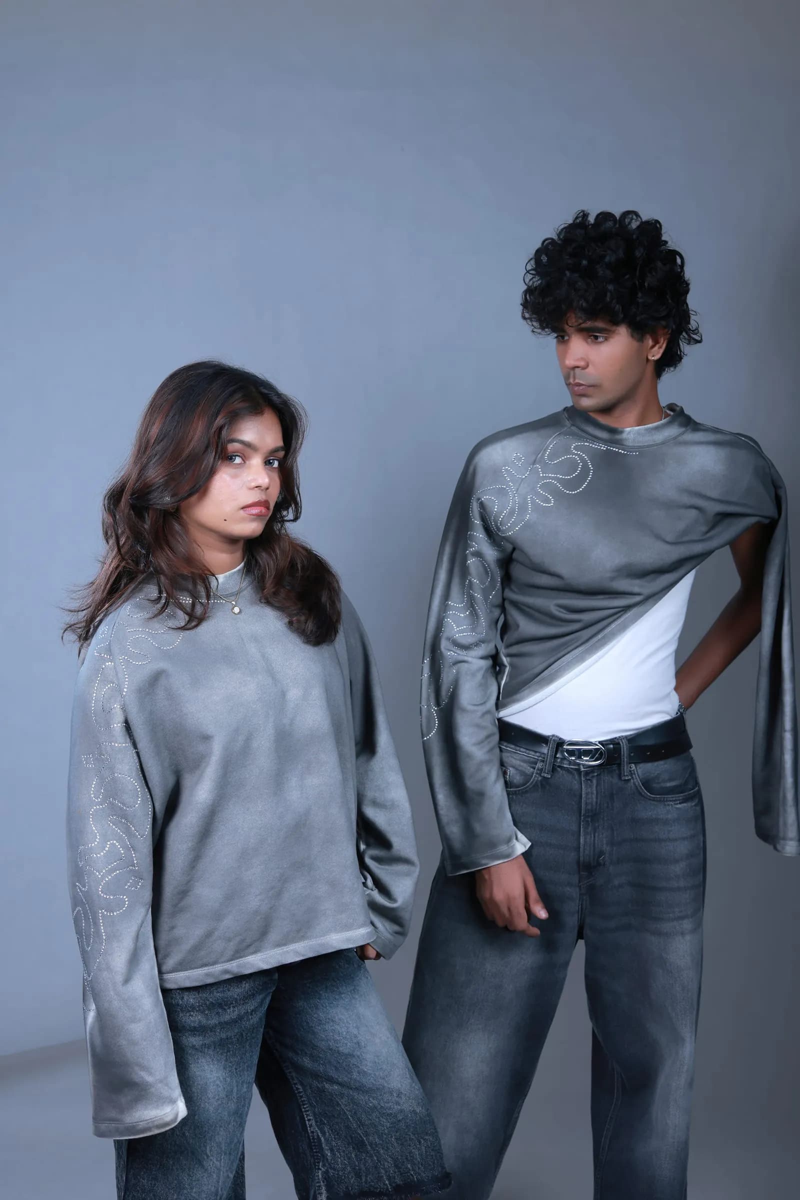 Two models wearing the grey long-sleeve